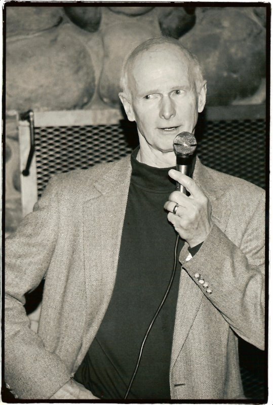 Ed Brune speaking at a family celebration